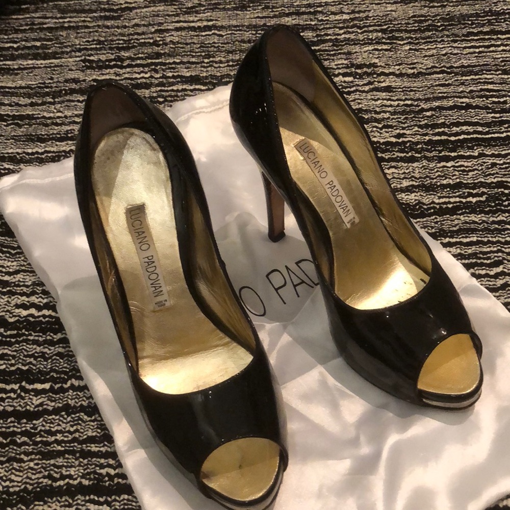 Black patent leather peep toe pumps